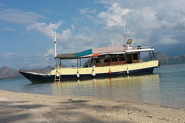 Wooden traditional boat for day excursion to Rinca Island in Komodo National Park in Indonesia